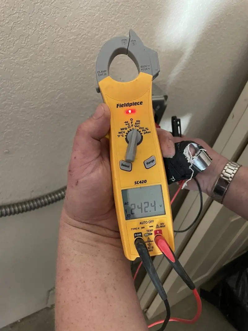 Voltage testing with clamp meter during Circuit Breaker Repair in Twin Lakes
